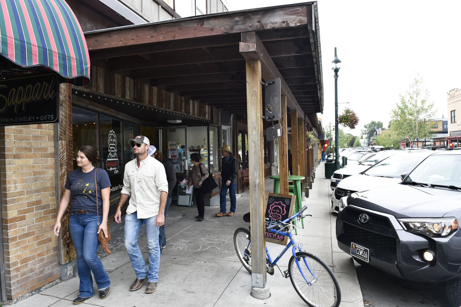 Shoppers walk down Central Avenue